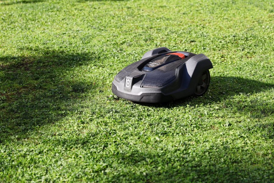 Husqvarna robotic lawn mower cutting grass
